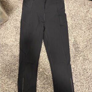 Lululemon Black carpris Sz 4